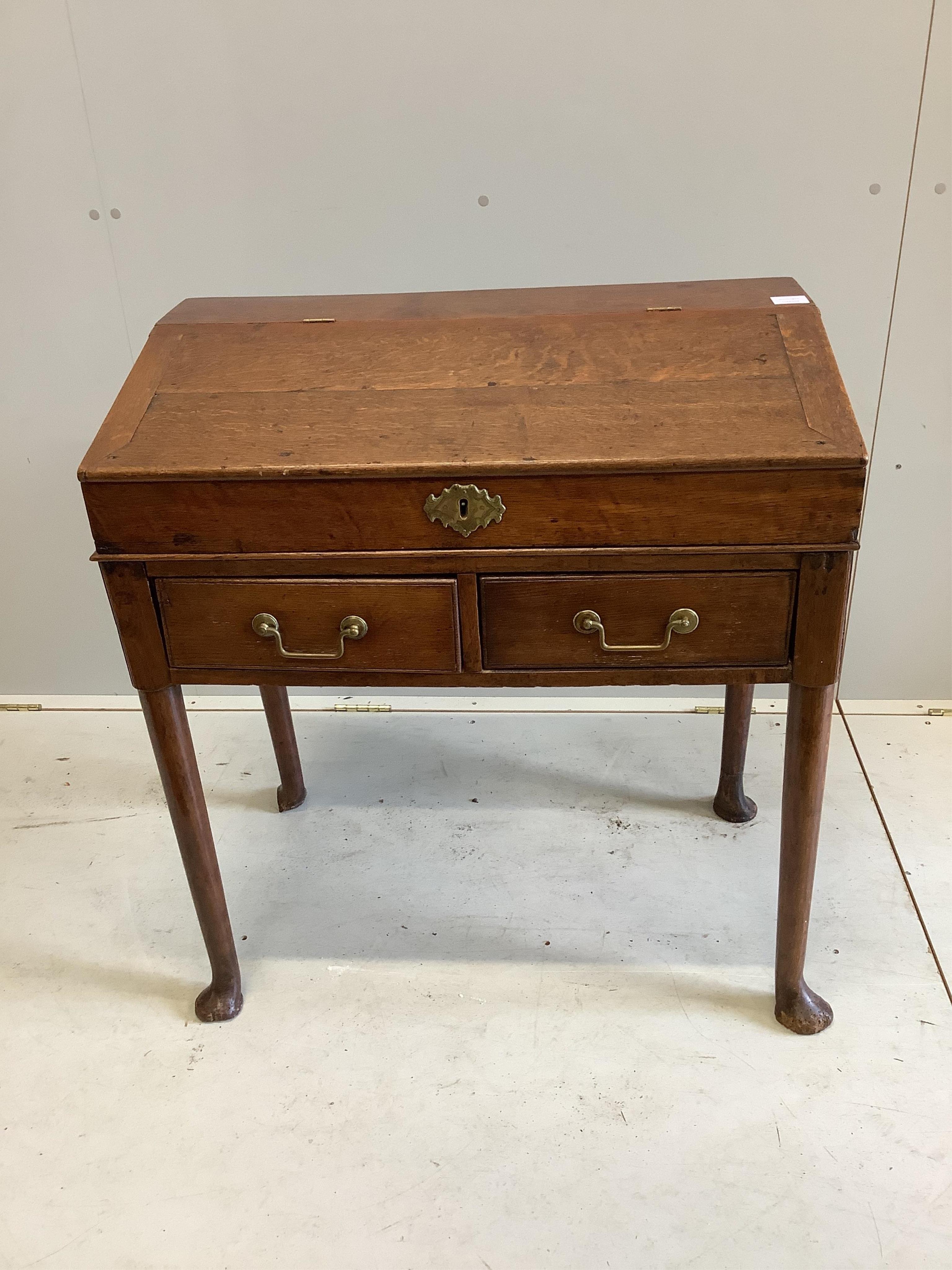 A George III oak desk, width 79cm, height 84cm. Condition - good